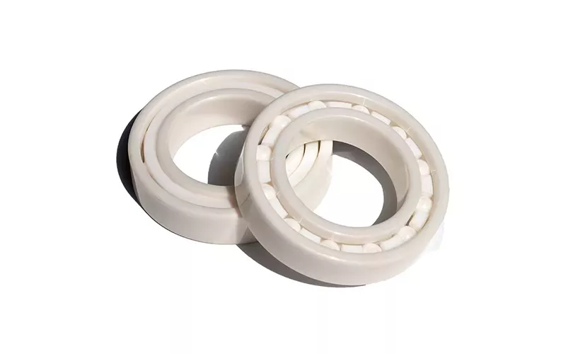 Dynamics of Alumina Bearing Balls in Adverse Conditions