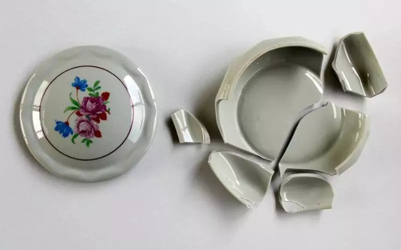 Cracked ceramic part vs intact part comparison