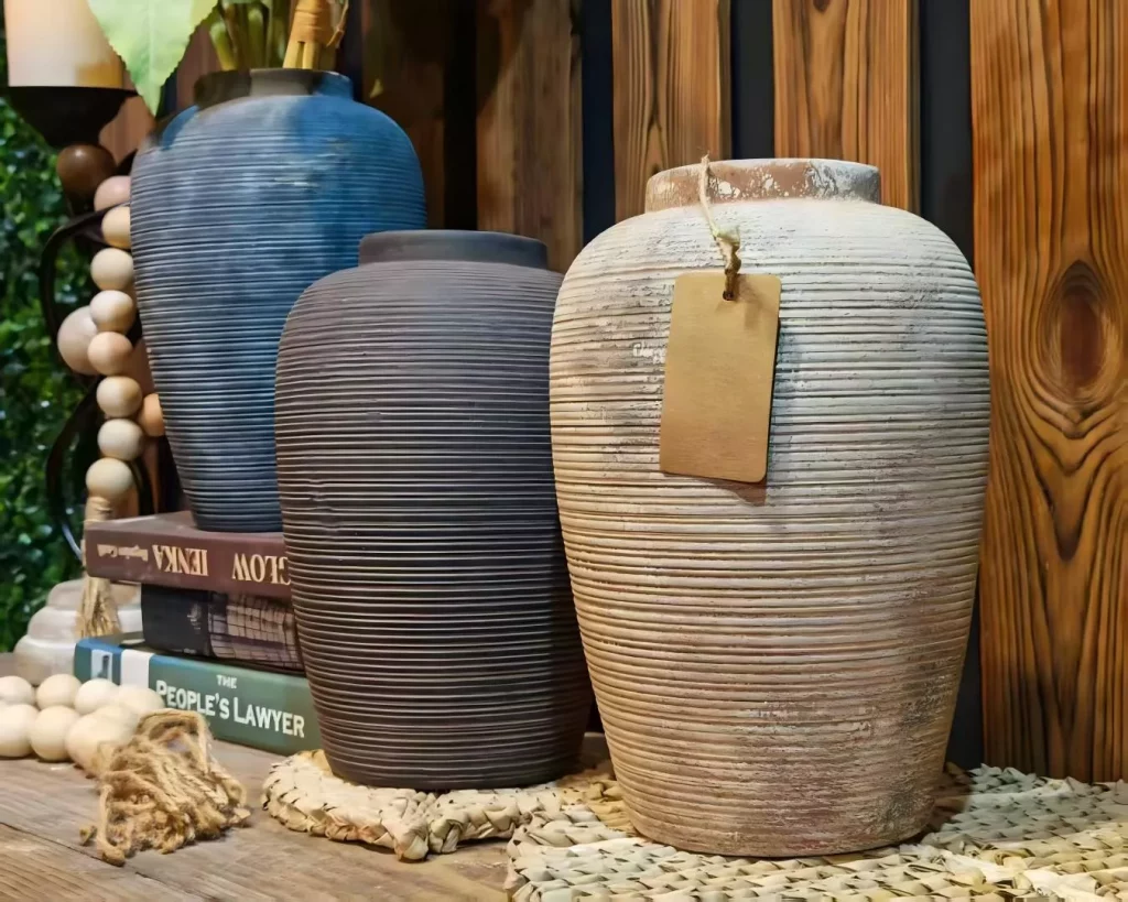 Ribbed ceramic vases that hold the quiet beauty of imperfection.