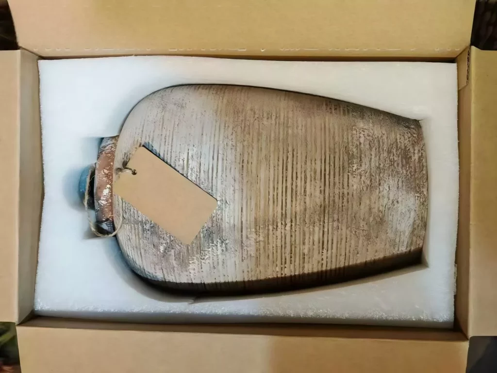 Ribbed ceramic vases that hold the quiet beauty of imperfection.