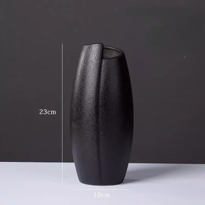 Black matte ceramic vase with vertical texture, modern home decor for flowers