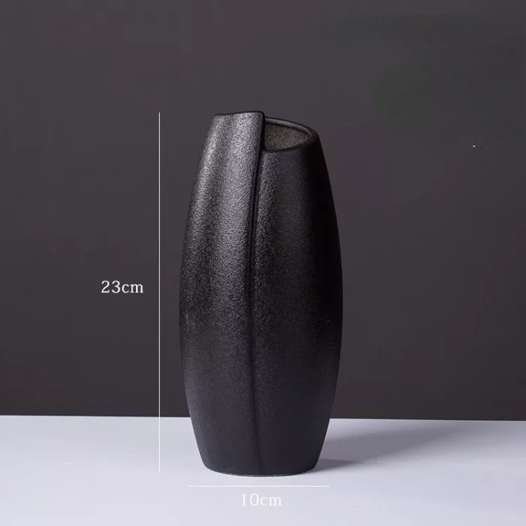 Black matte ceramic vase with vertical texture, modern home decor for flowers