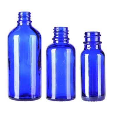 blue essential oil glass bottle