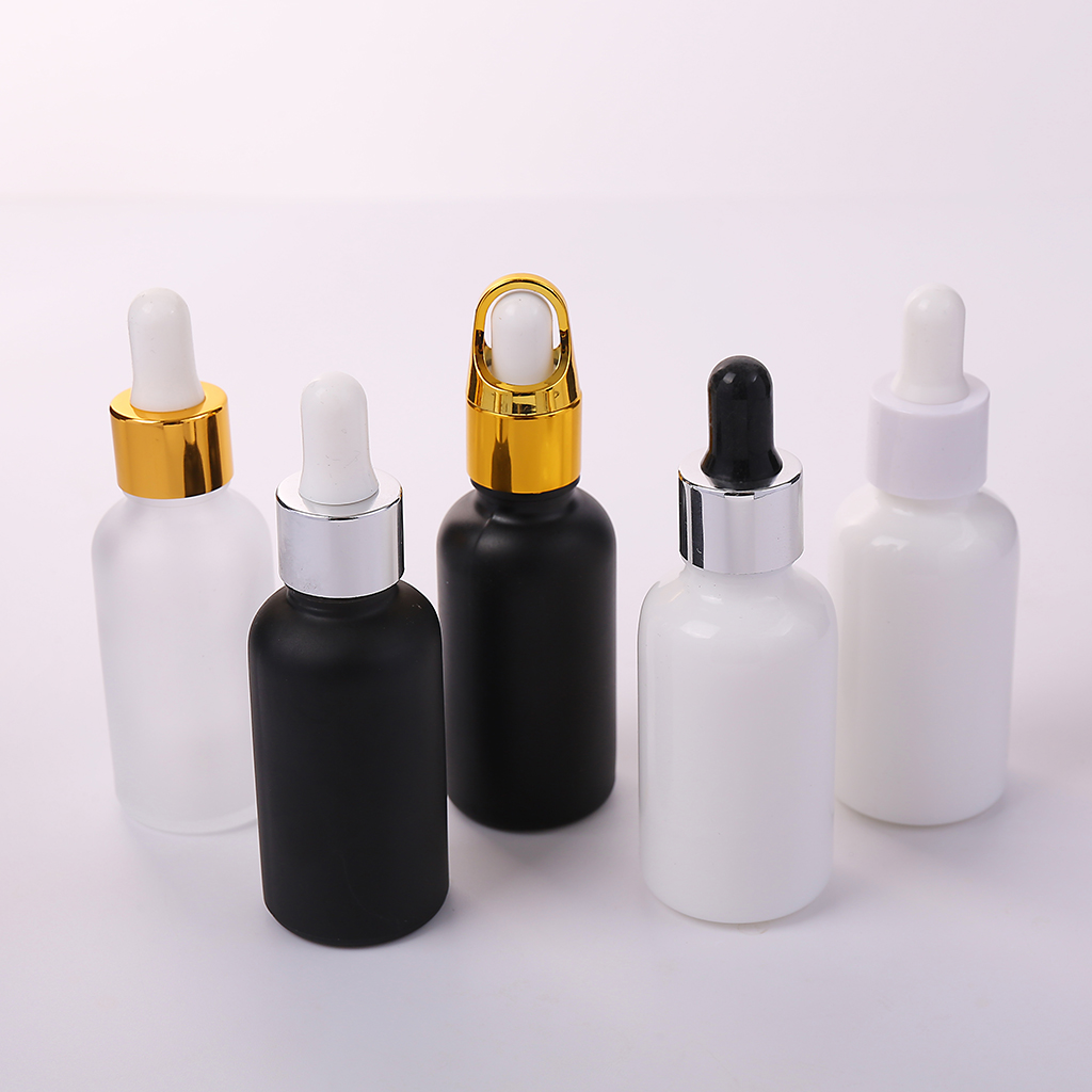 white essential oli bottle