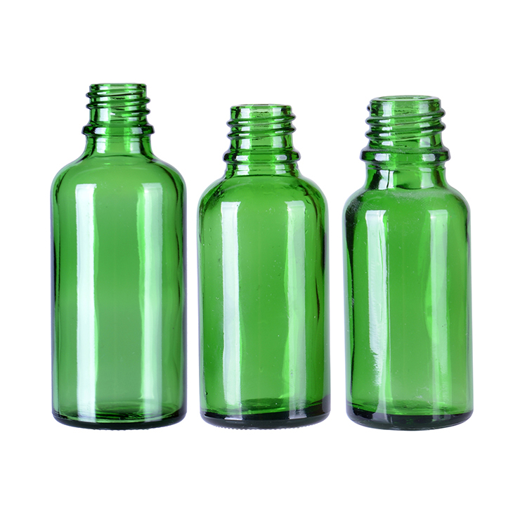 blue essential oil glass bottle