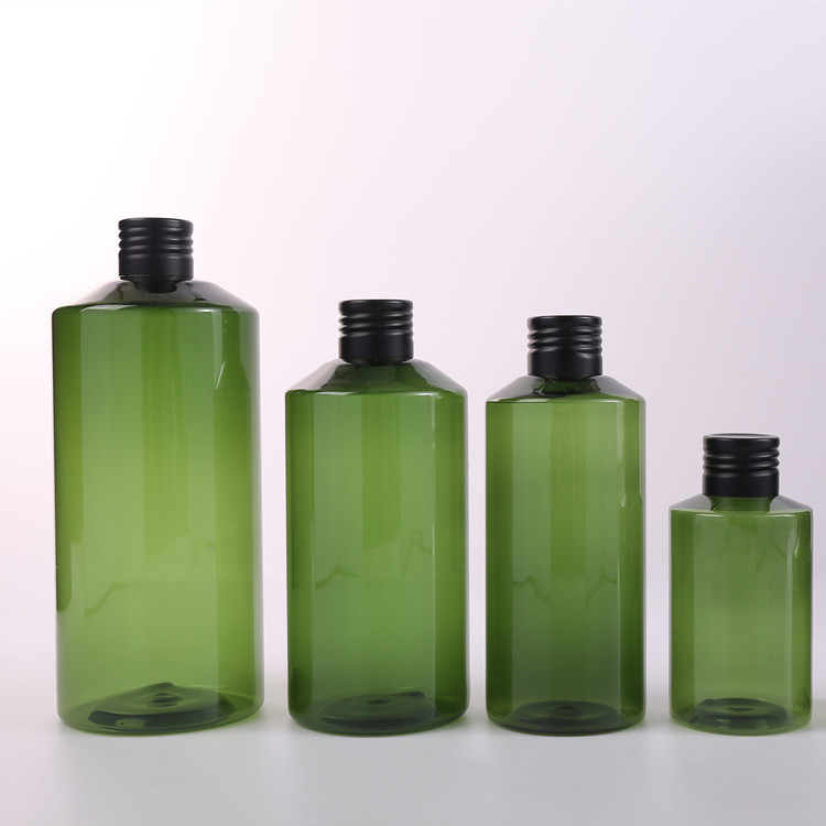 green cosmetic glass bottle