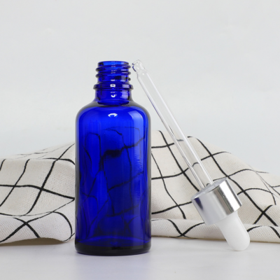 blue glass  essential oil bottle