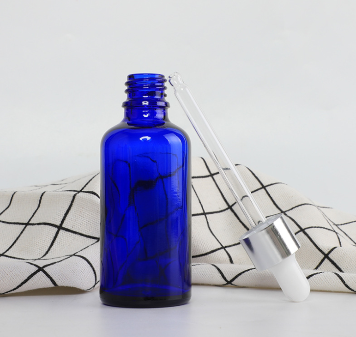 blue glass  essential oil bottle