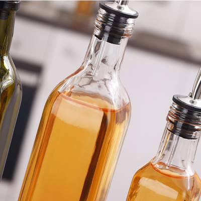 olive oil glass bottle with spray head