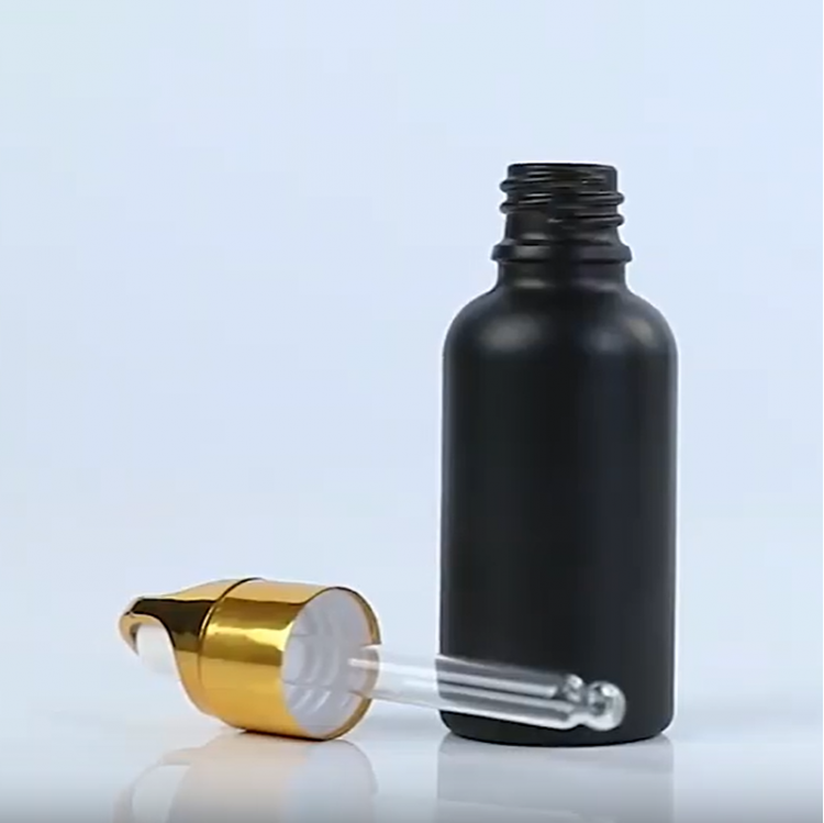 black essential oli bottle