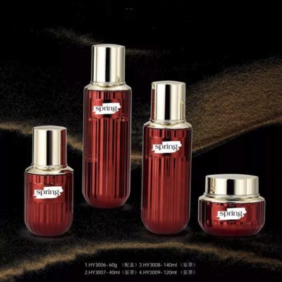 red glass cosmetic bottle