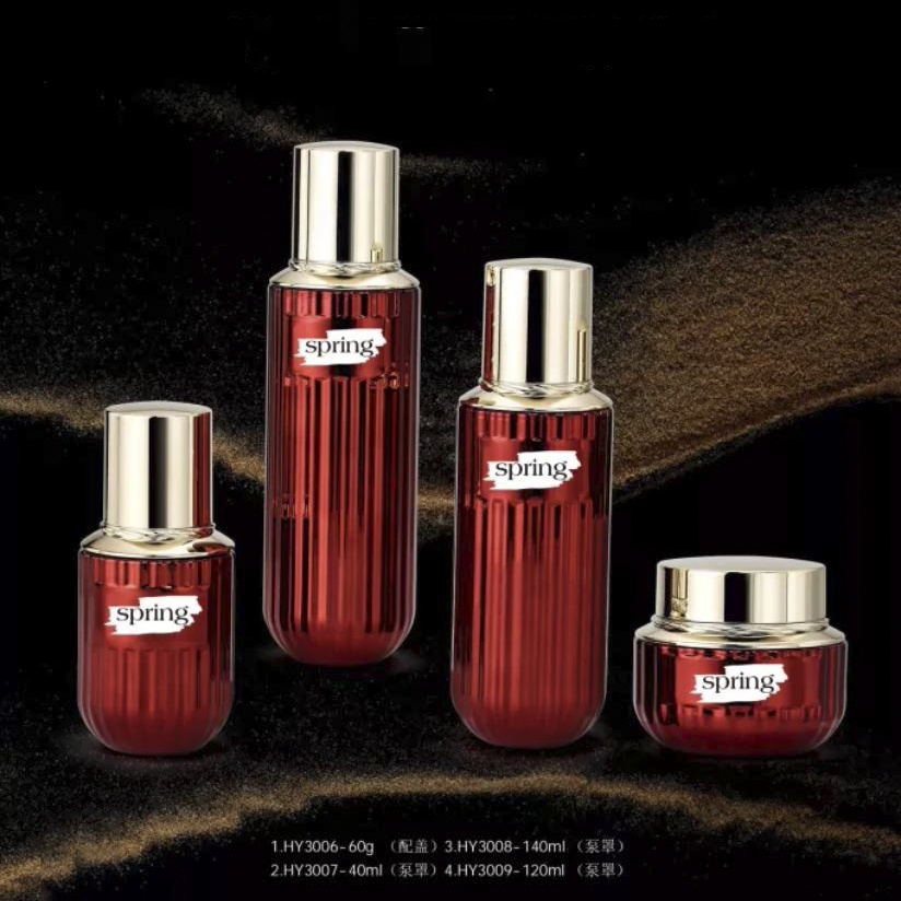 red glass cosmetic bottle