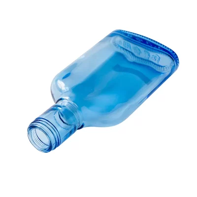 blue glass flat bottle